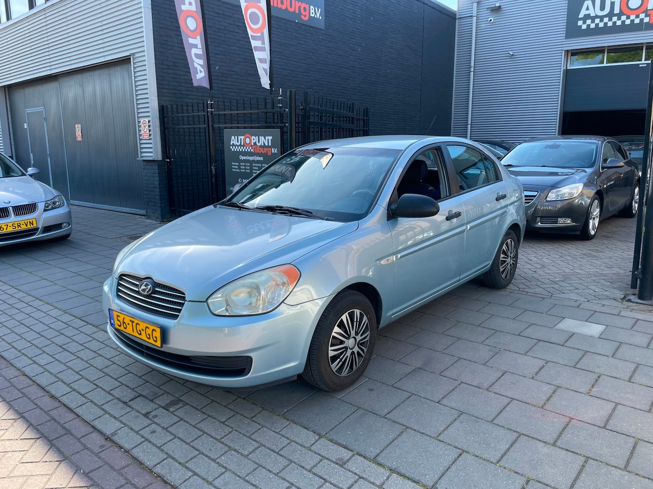 Hyundai Accent - 1.4i Dynamic 2e Eigenaar! Airco NAP APK - AutoWereld.nl