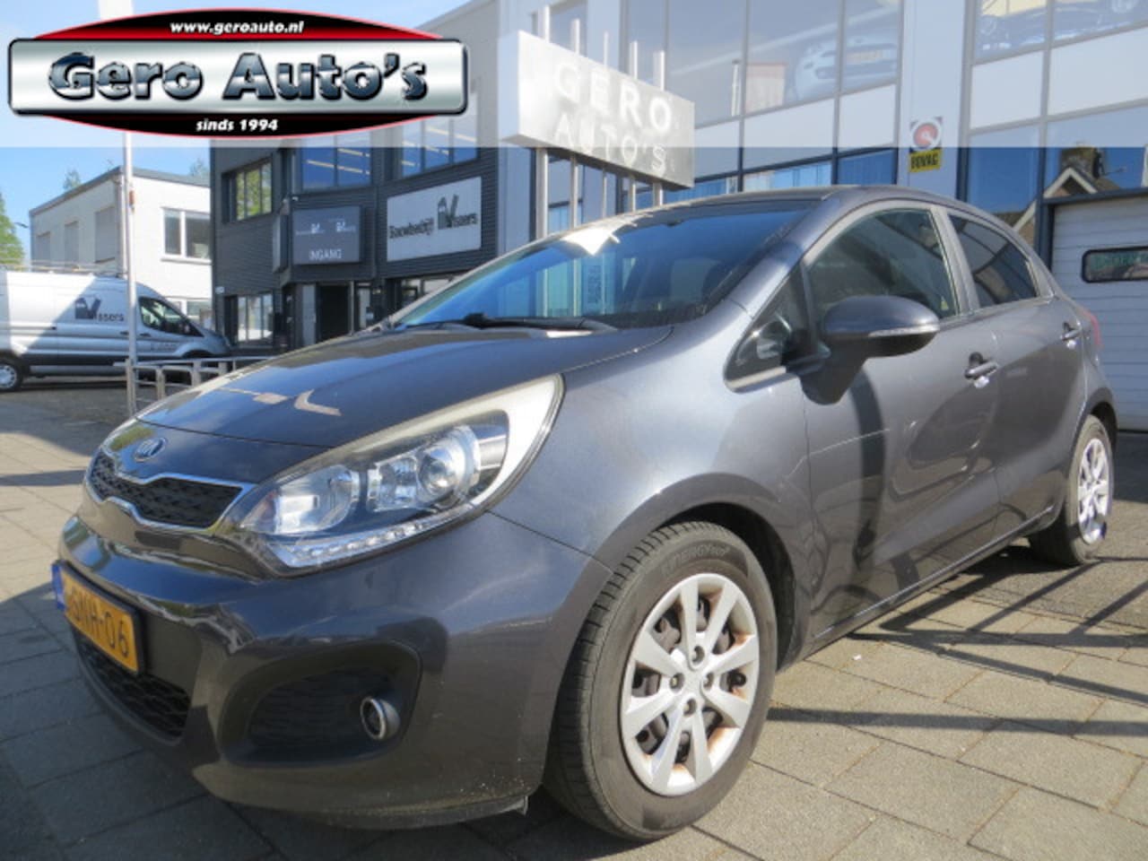 Kia Rio - 1.2 CVVT Super Pack nl-auto ! 5 drs ,airco ecc ,cr control ,pdc etc - AutoWereld.nl
