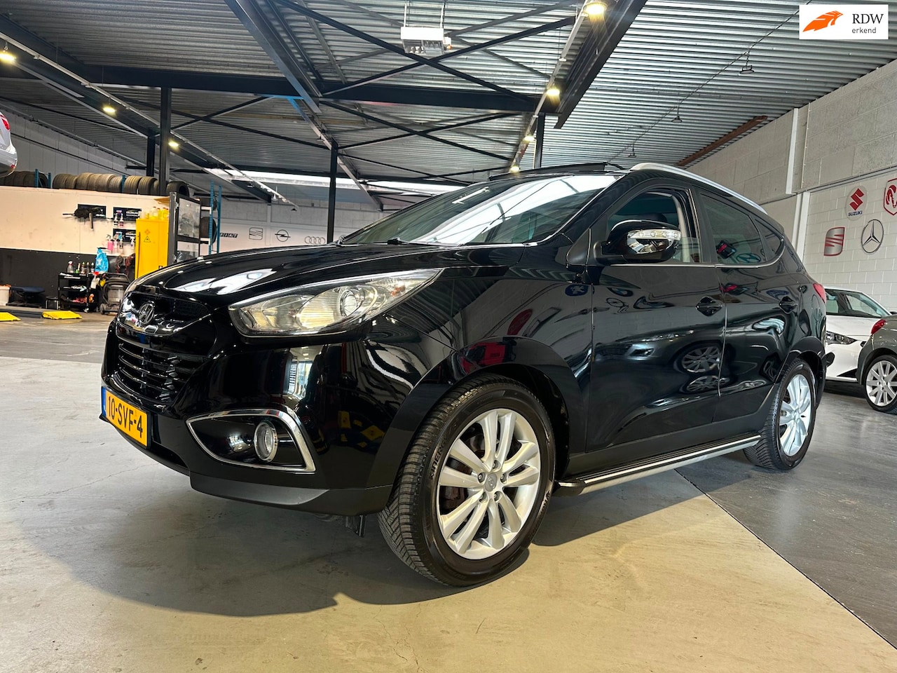 Hyundai ix35 - 2.0i i-Catcher/panoramadak/Leder/Dealer onderhouden/Apk nieuw - AutoWereld.nl