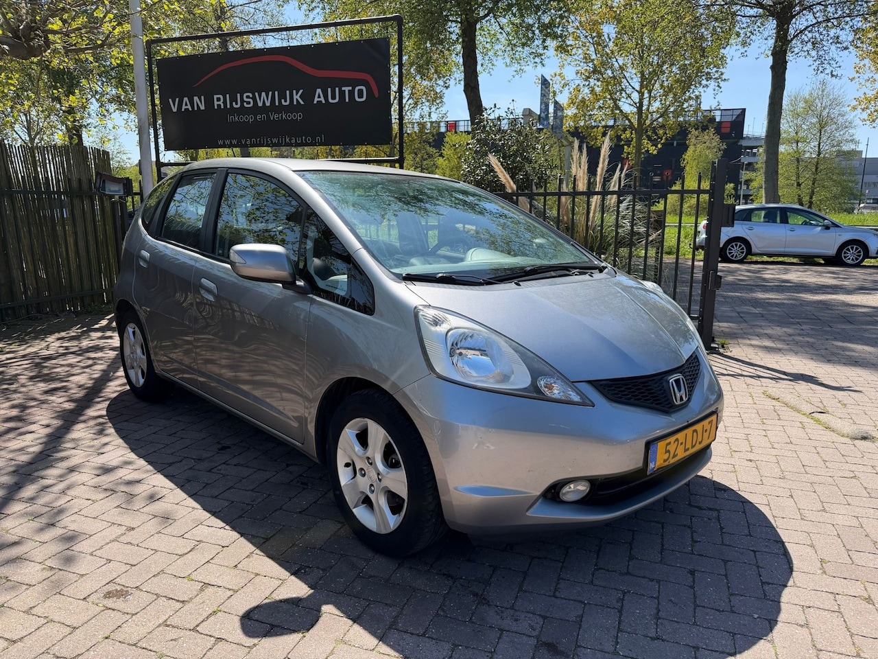 Honda Jazz - 1.4 Comfort Clima Cruise-con Elec-ram - AutoWereld.nl