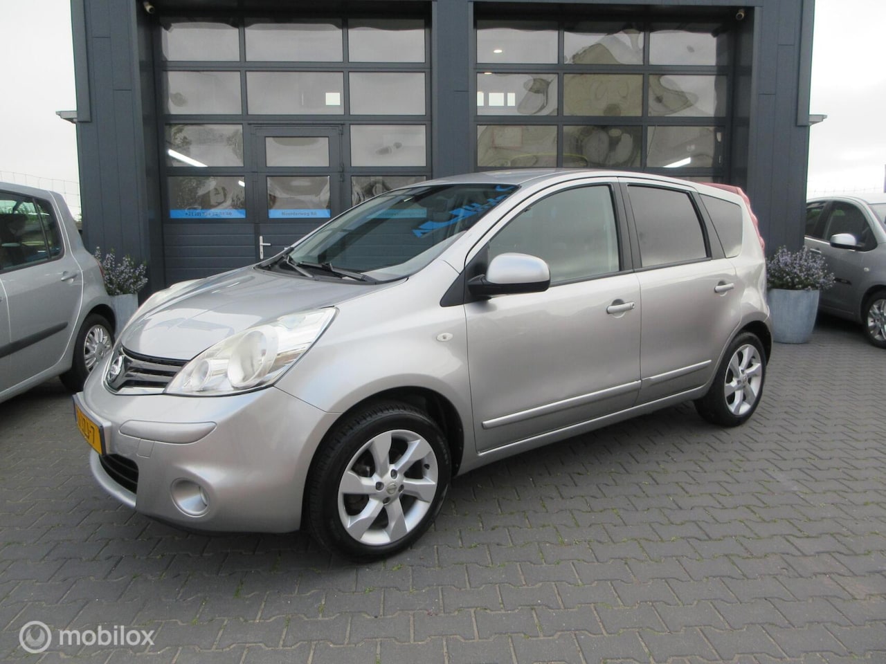 Nissan Note - 1.6 Acenta Airco Navi Cruise Trekhaak Org Ned - AutoWereld.nl