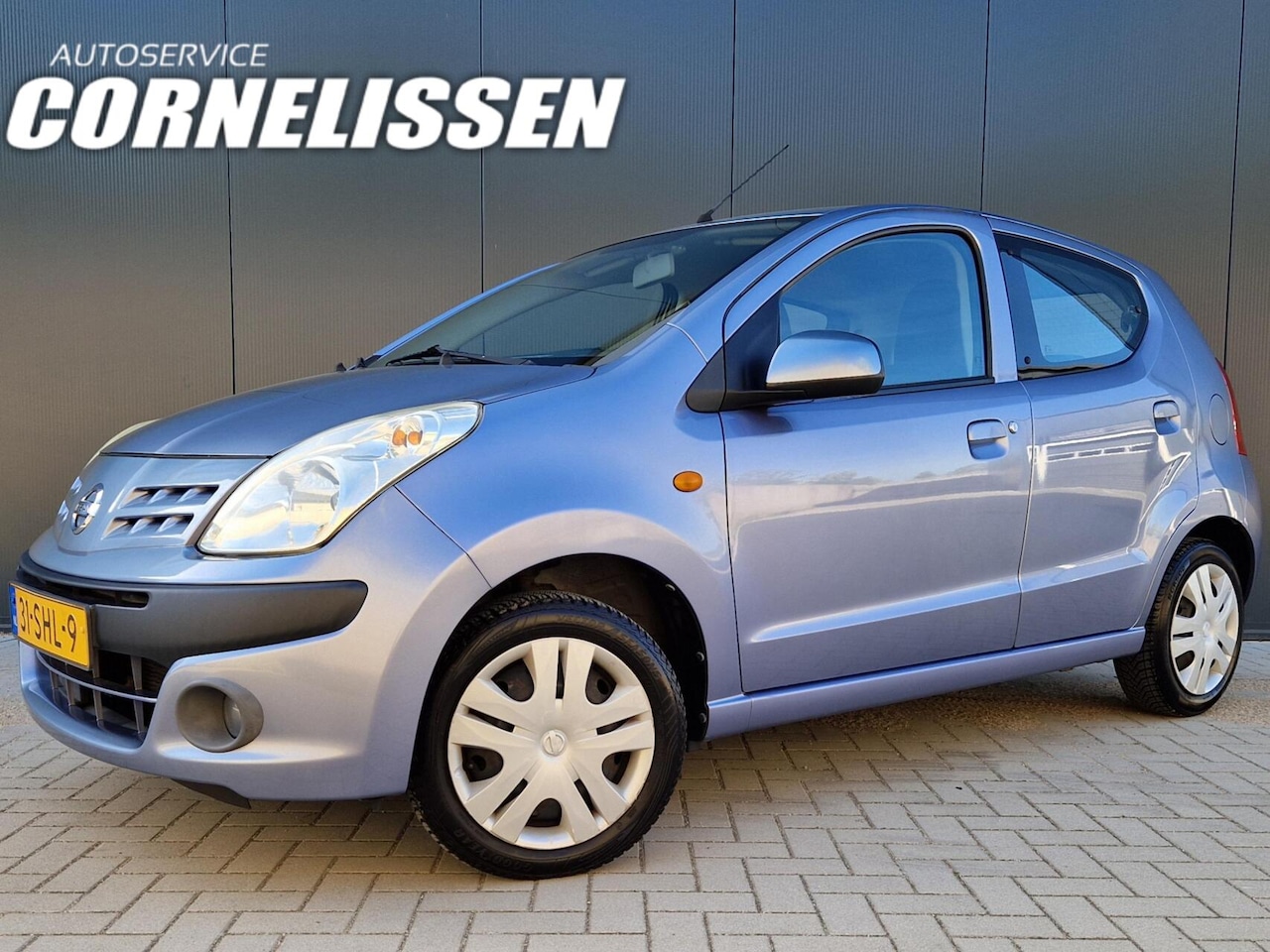 Nissan Pixo - 1.0 Acenta AIRCO | 4-SEIZOENSBANDEN | NL-AUTO - AutoWereld.nl