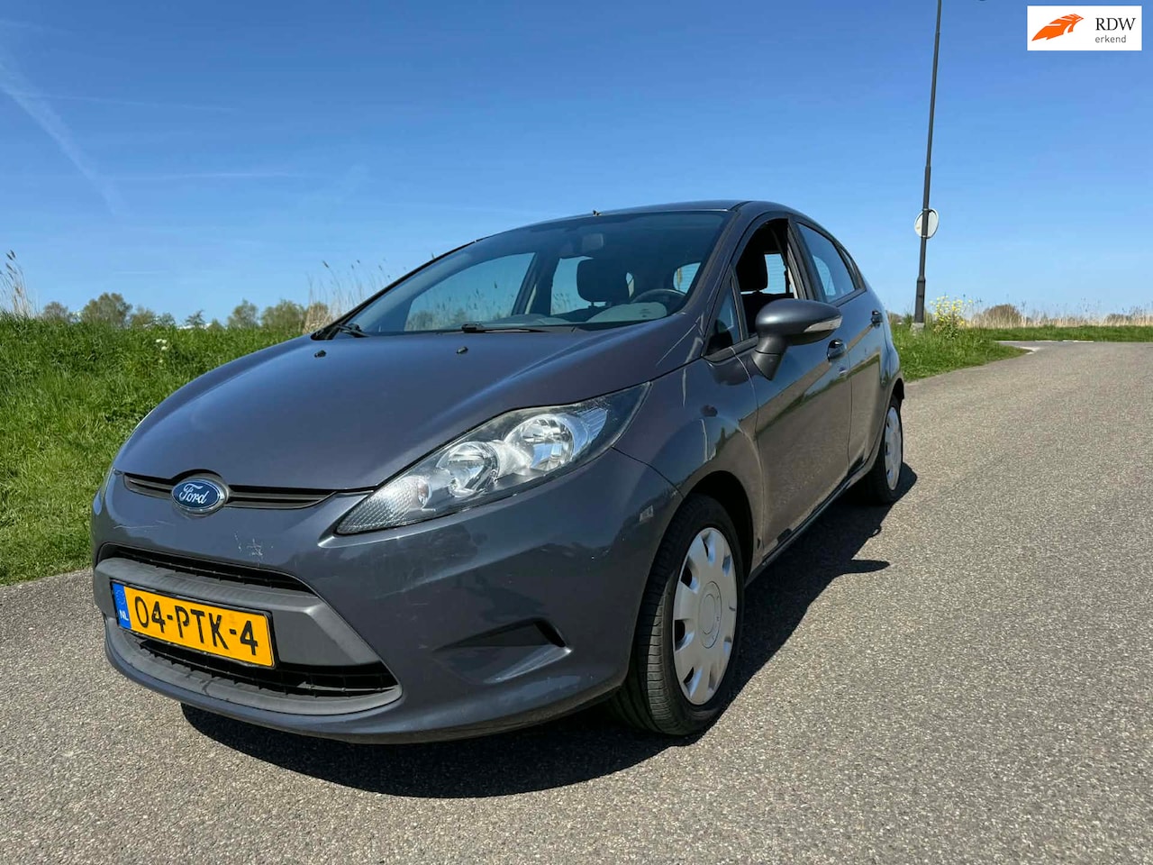 Ford Fiesta - 1.25 Limited incl nw apk nw distributie airco, garantie ! - AutoWereld.nl