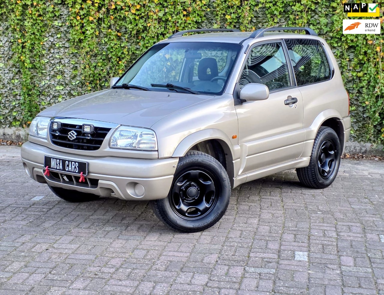 Suzuki Grand Vitara - 2.0 Metal Top Automaat Airco APK Sport Velgen - AutoWereld.nl