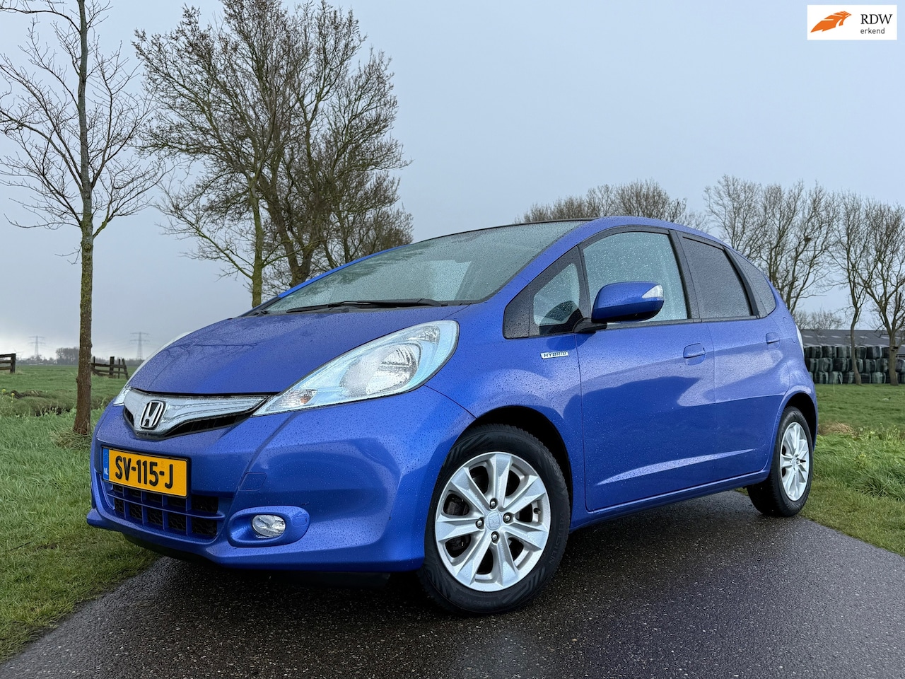 Honda Jazz - 1.4 Hybrid Elegance Automaat | 1e Eigenaar | Panoramadak | Stoelverwarming | Clima | 15" V - AutoWereld.nl