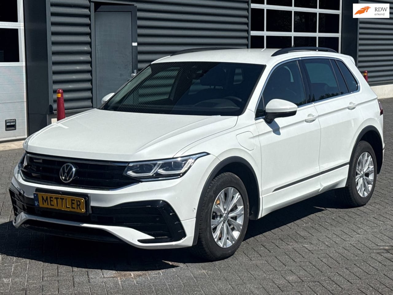 Volkswagen Tiguan - 1.4 TSI eHybrid R-Line , 360 camera, trekhaak, memory seats - AutoWereld.nl