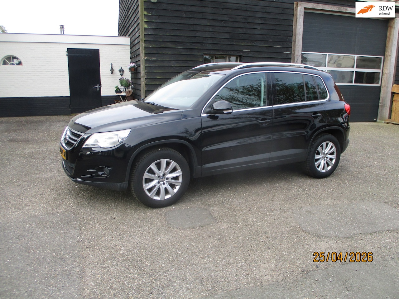 Volkswagen Tiguan - 1.4 TSI Sport&Style 4Motion 2e EIG. - AutoWereld.nl
