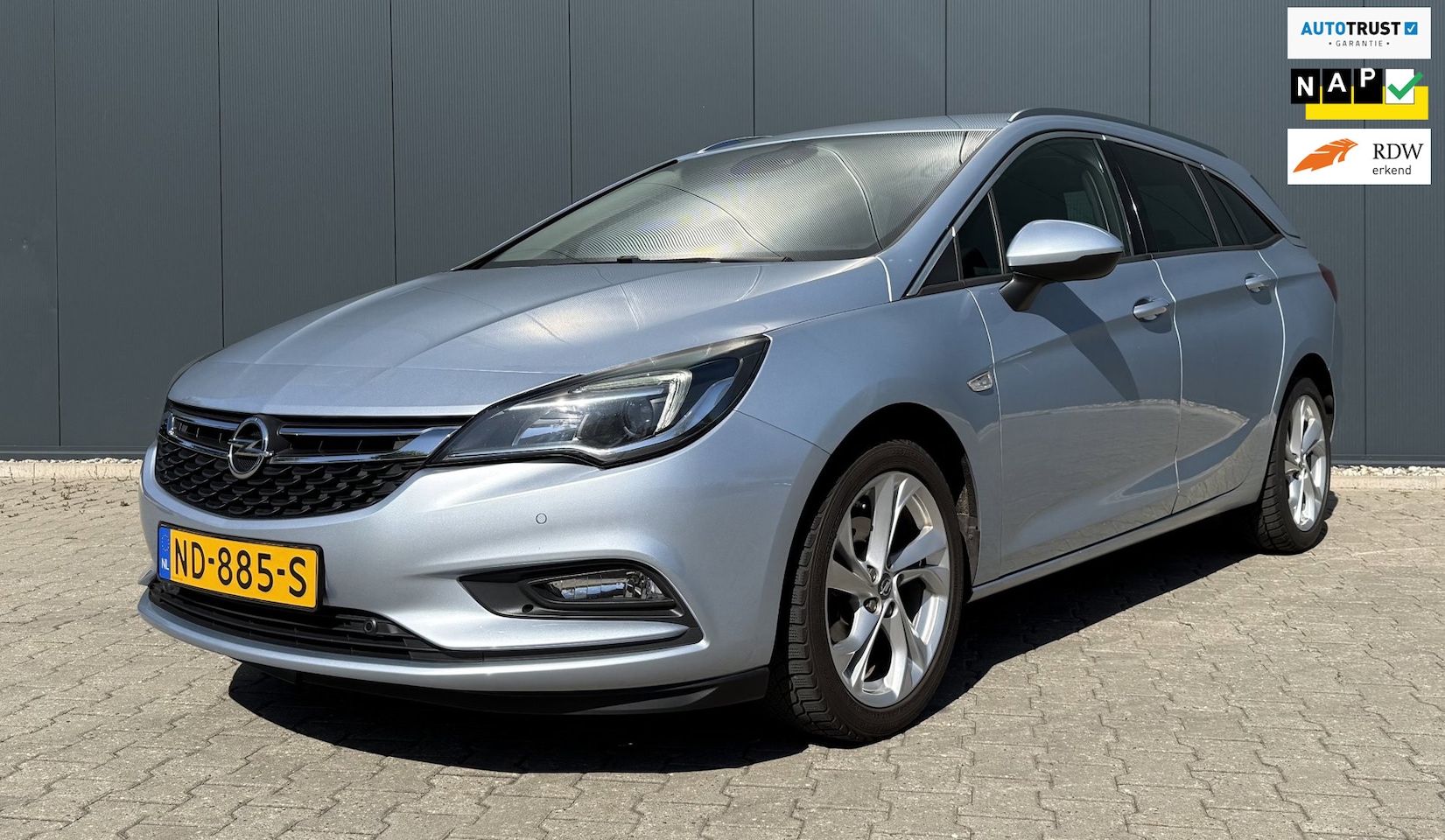 Opel Astra Sports Tourer - 1.0 Innovation Airco Cruise Leder Navi Camera - AutoWereld.nl