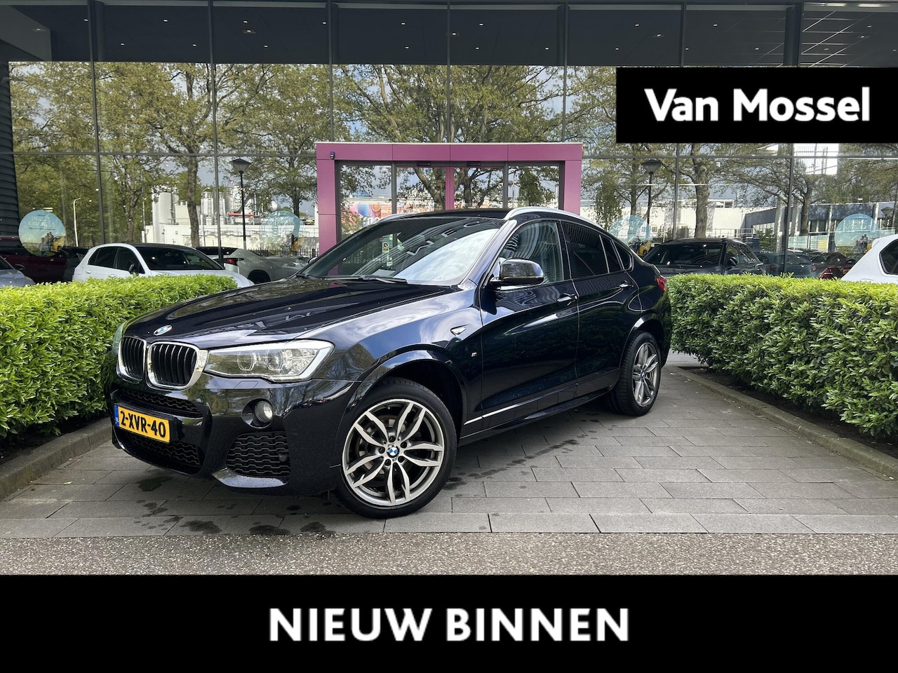 BMW X4 - xDrive20i Executive | AUTOMAAT | TREKHAAK | M-PAKKET | NAVIGATIE | ACHTERUITRIJCAMERA | SP - AutoWereld.nl
