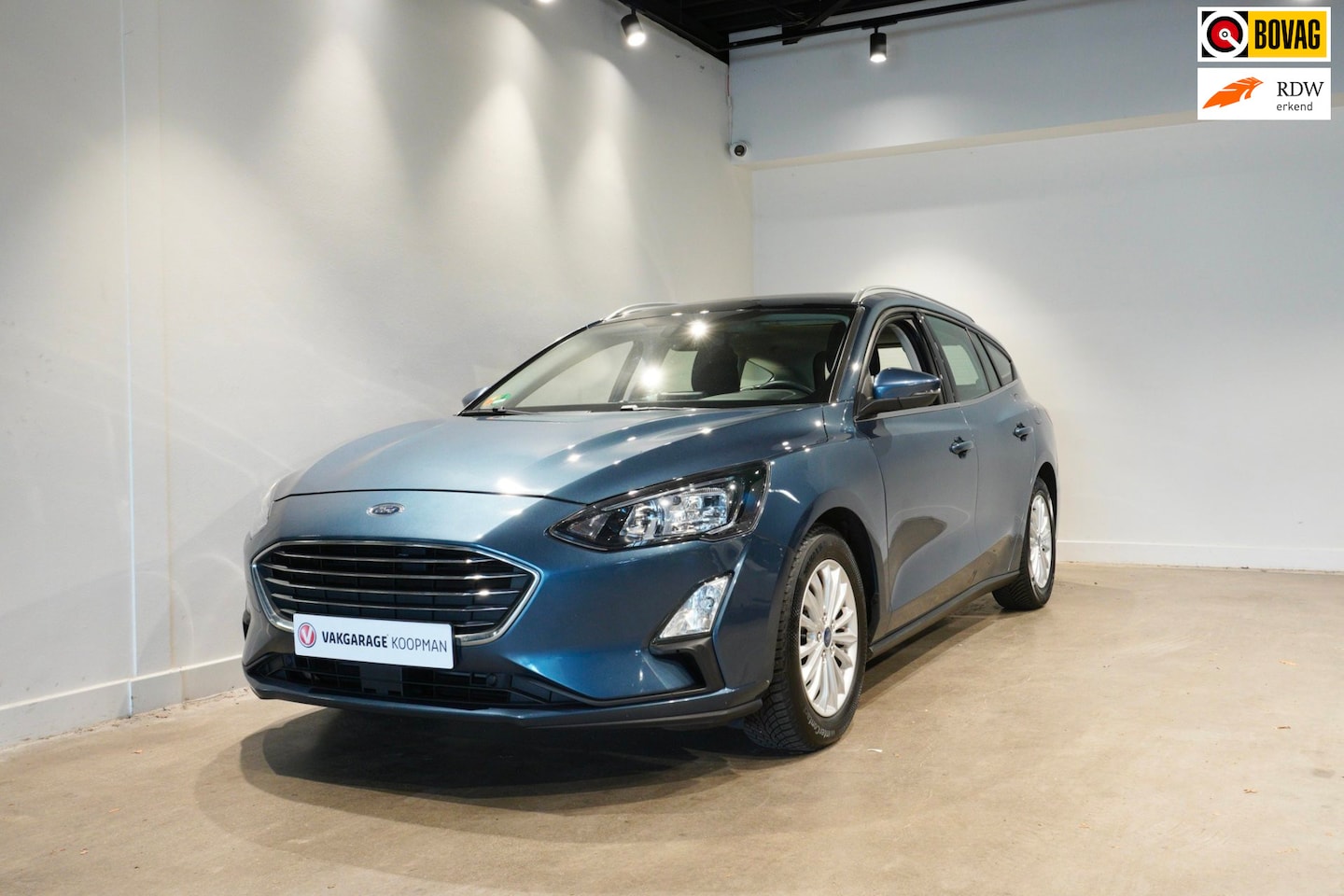 Ford Focus Wagon - 1.0 EcoBoost Titanium Business Trekhaak/Automaat - AutoWereld.nl