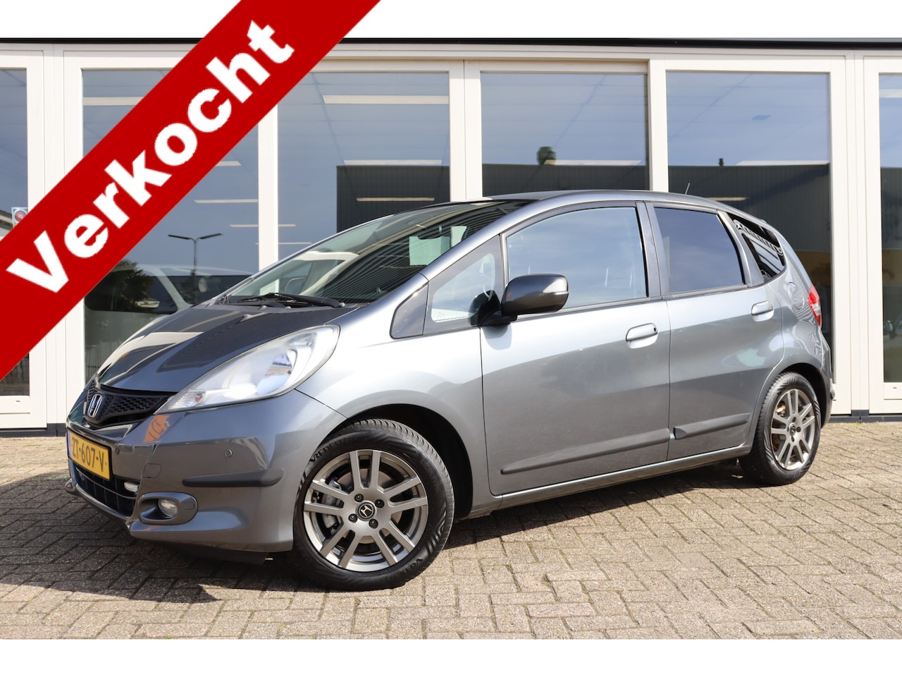 Honda Jazz - 1.4 Comfort Plus 1.4 Comfort Plus, Cruise Control, Airco, PDC V+A, Prijs Is Rijklaar Inclusief 6 Maanden Ga - AutoWereld.nl