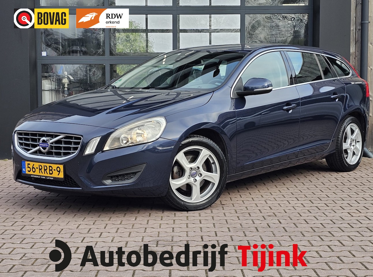 Volvo V60 - 1.6 T3 Momentum | Navi | Trekhaak | All-seasons | PDC | Cruise | Getint glas | - AutoWereld.nl