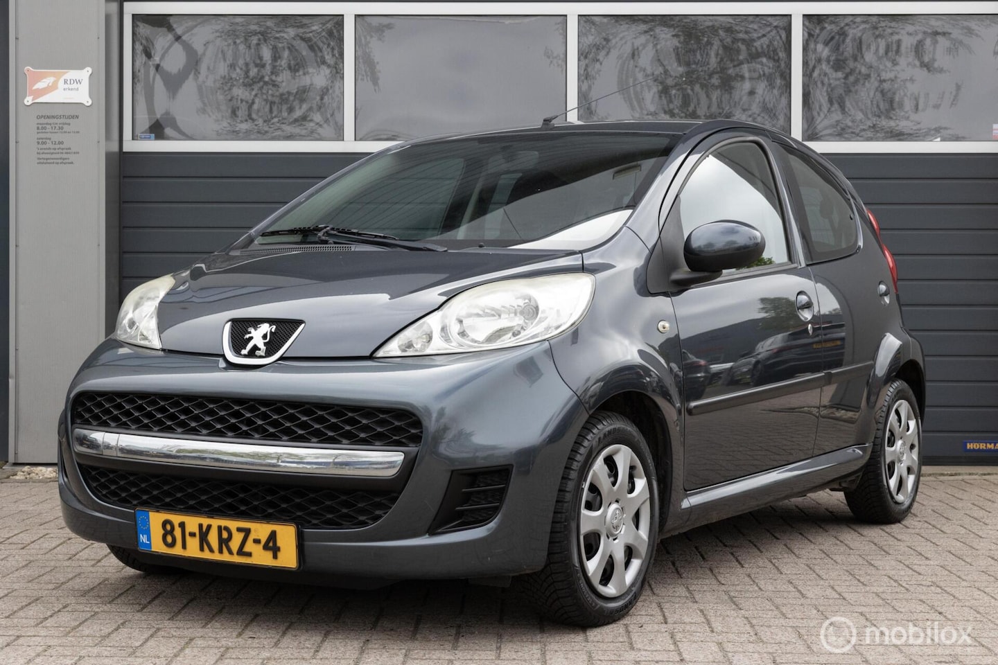 Peugeot 107 - 1.0-12V Sublime 5drs airco nw APK - AutoWereld.nl