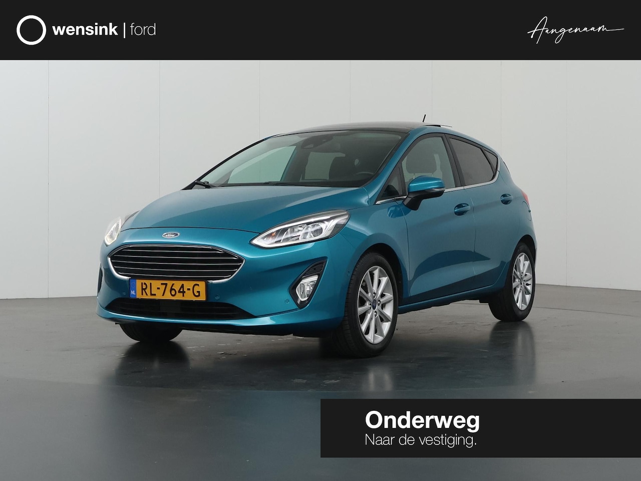 Ford Fiesta - 1.0 EcoBoost Titanium | Panoramadak | Winterpack | B&O | Parkeercamera | Navigatie | Clima - AutoWereld.nl