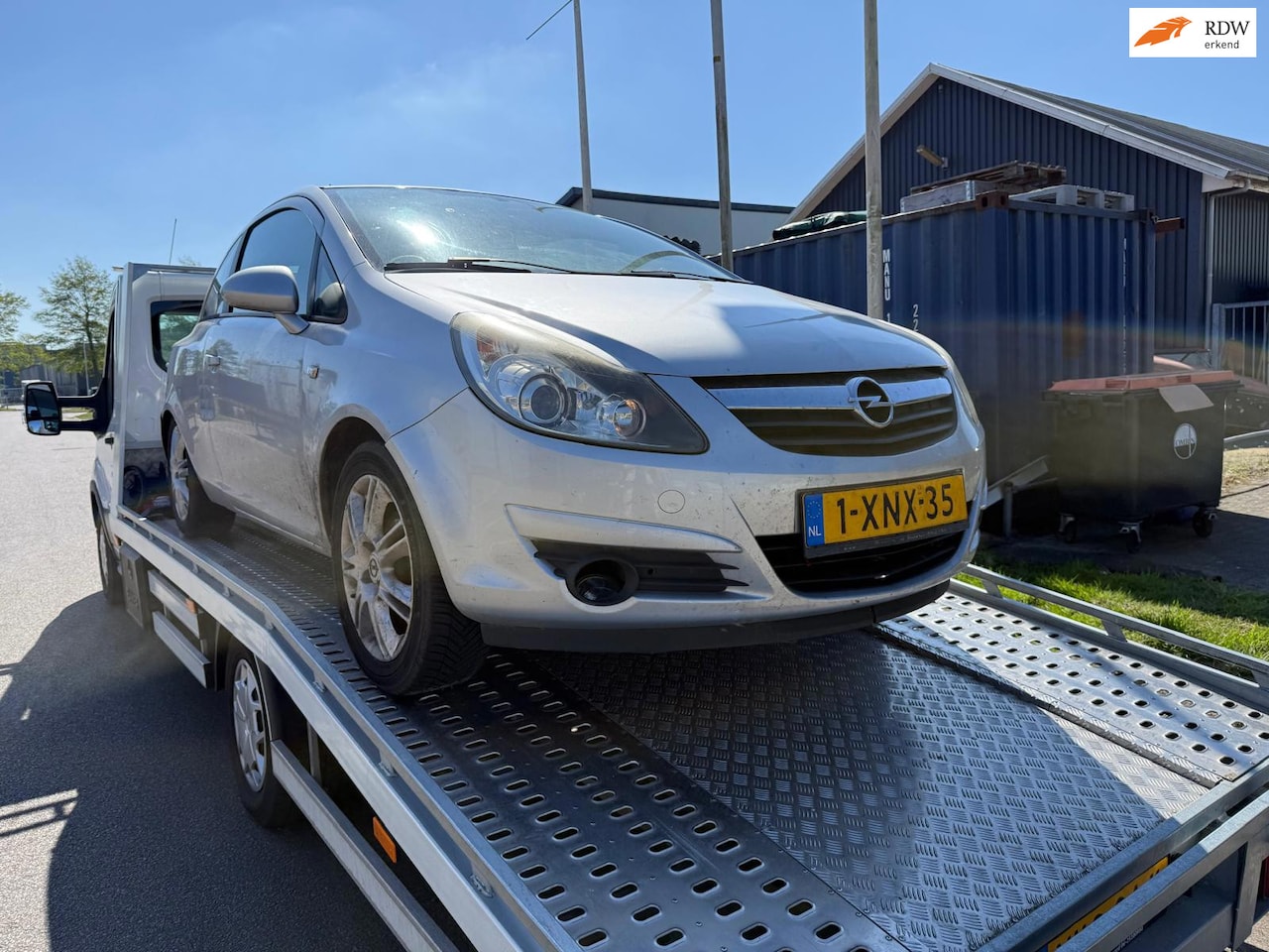 Opel Corsa - 1.4-16V Cosmo AUTOMAAT APK (advertentie lezen) - AutoWereld.nl