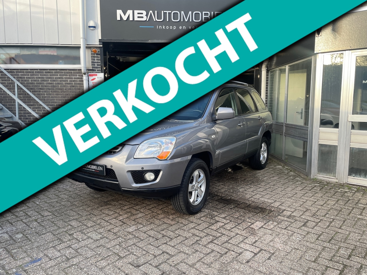 Kia Sportage - 2.0 CVVT X-ecutive/Airco/full Options/Nap/Lm Velgen/1 Jaar APK! - AutoWereld.nl