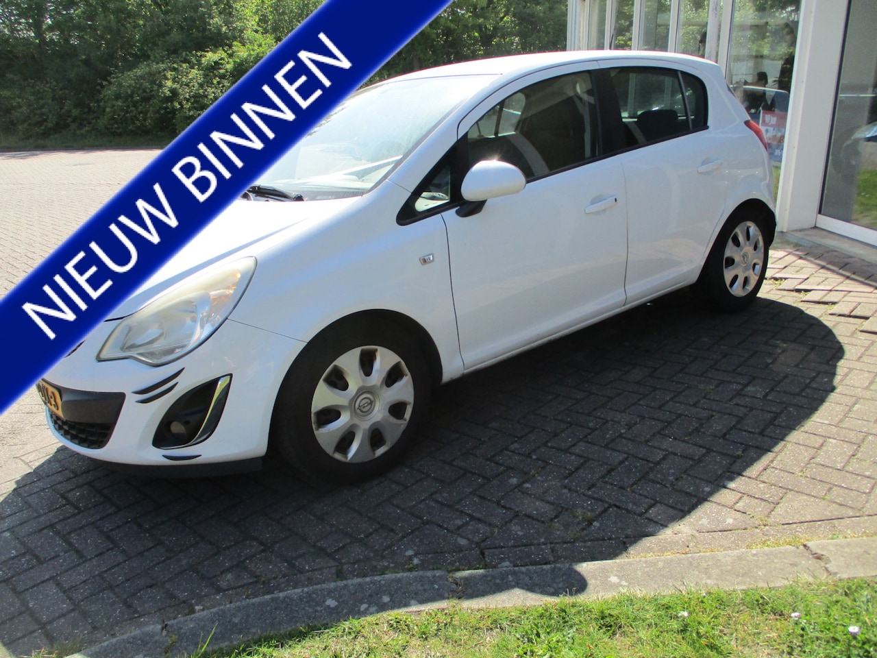 Opel Corsa - 1.4-16V Anniversary Edition 1.4-16V Anniversary Edition - AutoWereld.nl
