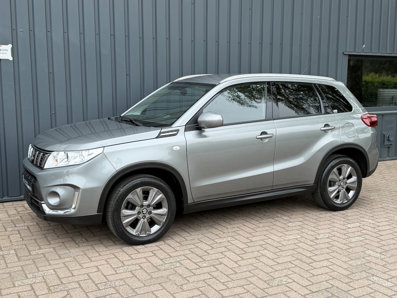 Suzuki Vitara - 1.0 Boosterjet Stijl DEALER ONDERHOUDEN!/NAVI!/COMPLEET!/ - AutoWereld.nl
