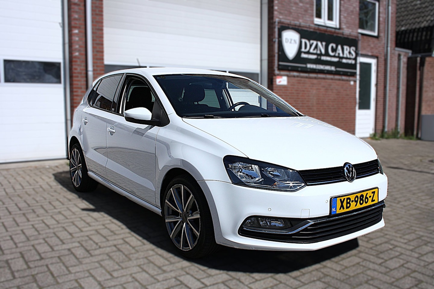 Volkswagen Polo - 1.2 TSI Highline 90 pk|Pdc|Navi|Bluetooth|5-deurs|Multimedia - AutoWereld.nl