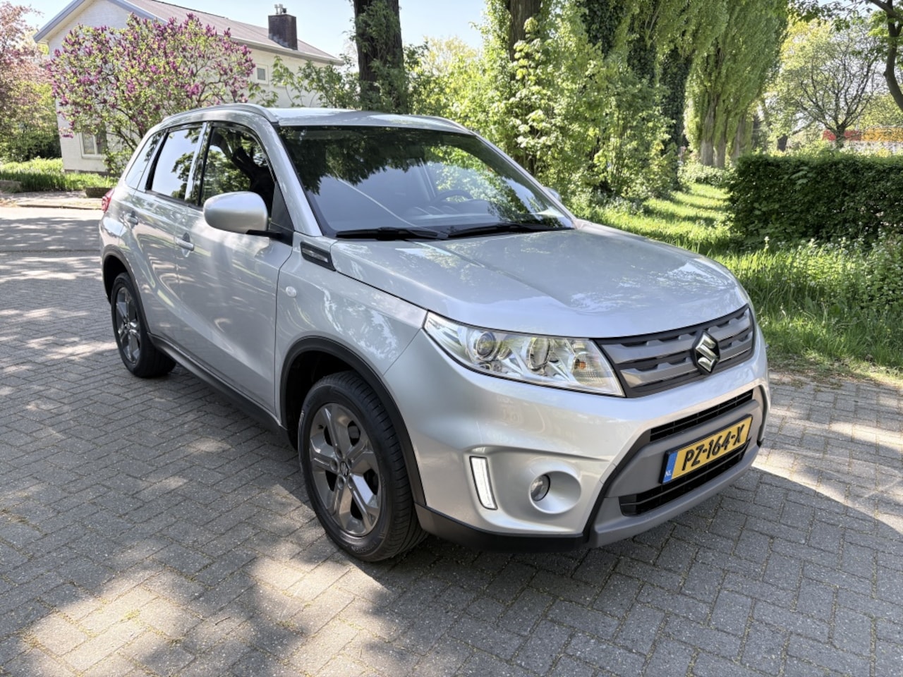 Suzuki Vitara - 1.6i Exclusive (Navigatie, Camera) 138.000 Km - AutoWereld.nl