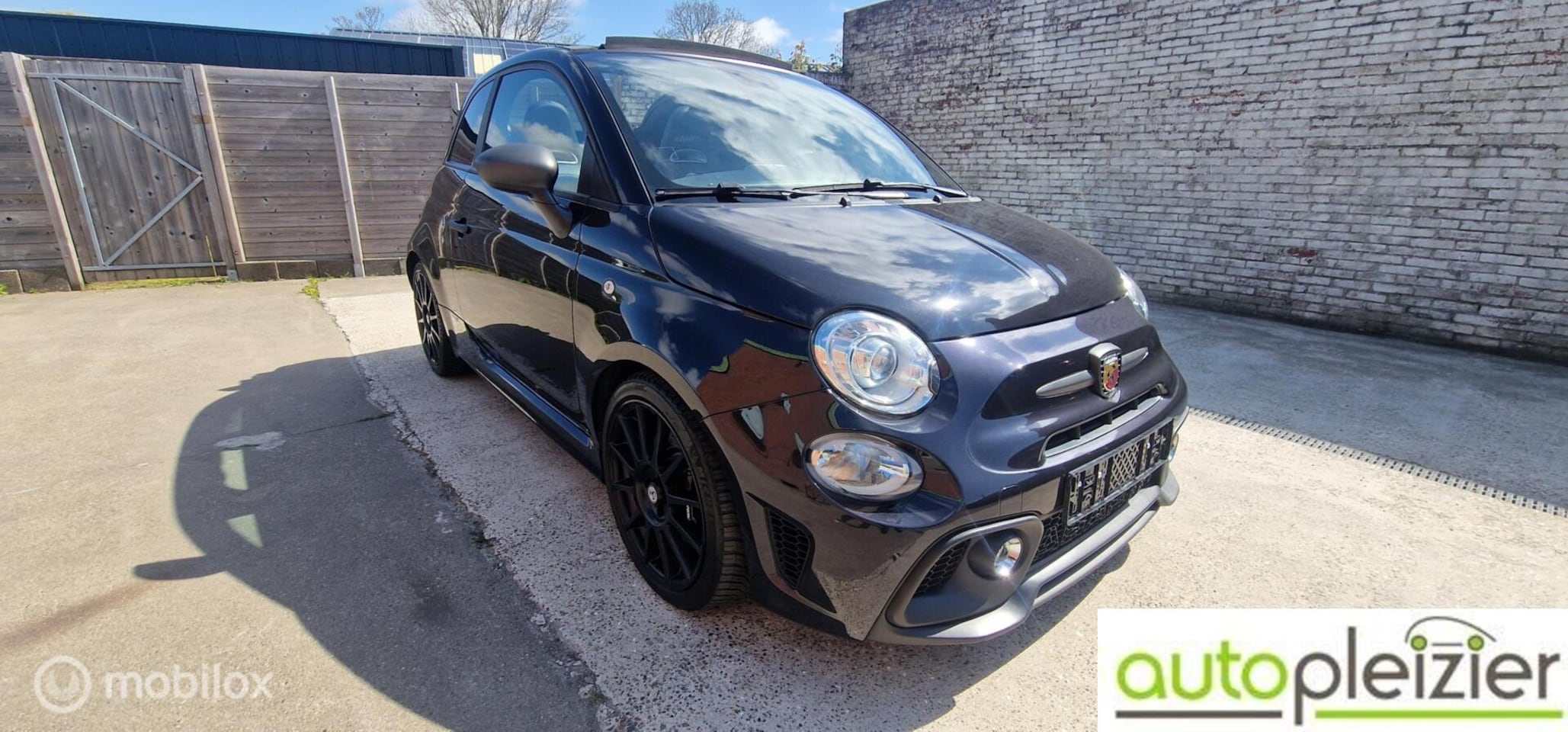 Fiat 500 C - 1.4 T-Jet Abarth Competizione 70th Anniversary 1.4 T-Jet Abarth Competizione 70th Anniversary - AutoWereld.nl