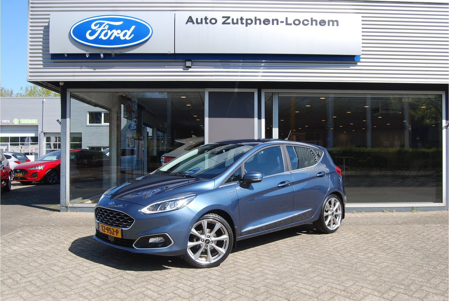 Ford Fiesta - 1.0 EcoBoost 125PK Vignale | TREKHAAK | 18" VELGEN | VOORRUITVERWARMING | BLISS | KEYLESS - AutoWereld.nl
