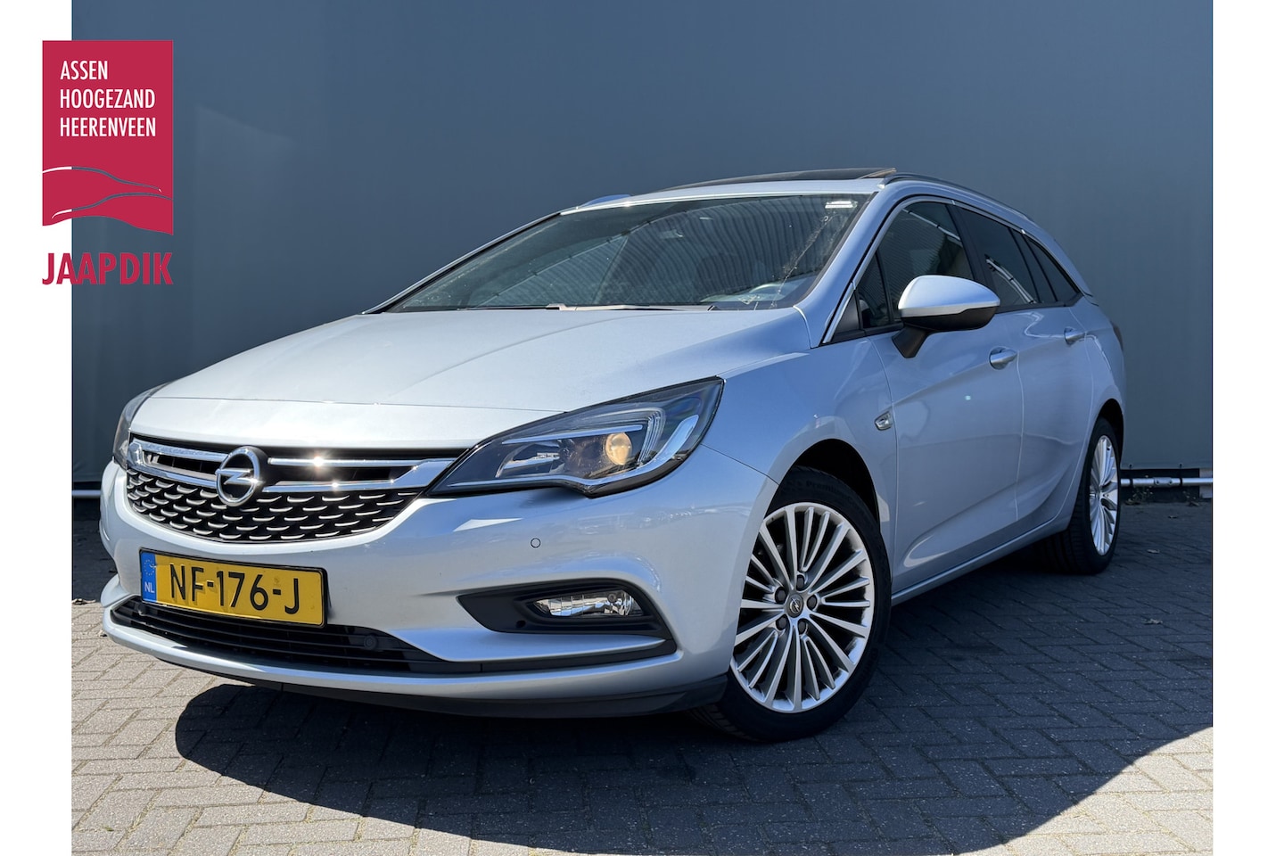 Opel Astra Sports Tourer - BWJ 2017 1.4 150 PK Business+ SCHUIF-KANTEL DAK | TREKHAAK | CRUISE | NAVI | PDC - AutoWereld.nl