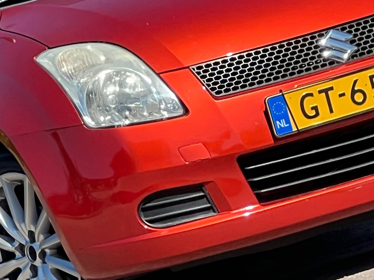 Suzuki Swift - 1.6 Sport - Orange Pearl - Lekker Sportief - AutoWereld.nl