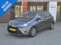 Toyota Yaris - 1.5 Hybrid DESIGN NAVI CRUISE CLIMA CAMERA BLUETOOTH 15'' LM-VELGEN NL-AUTO