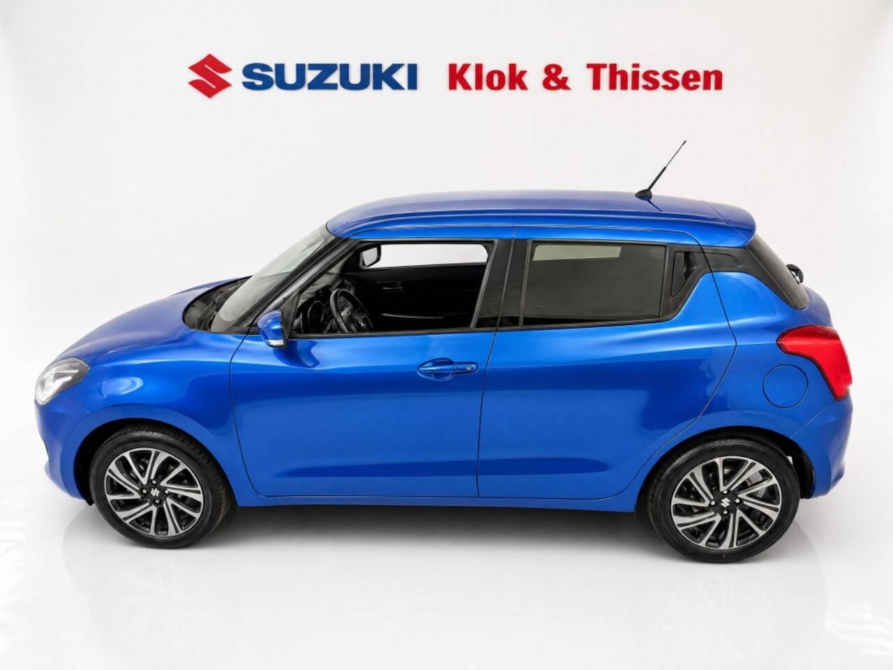 Suzuki Swift - fabrieksgar. t/m 09-03-2034 1.2 Style Sm Hybr Clima LMV PDC CC NAVI Excl. BTW € 16.750,- - AutoWereld.nl
