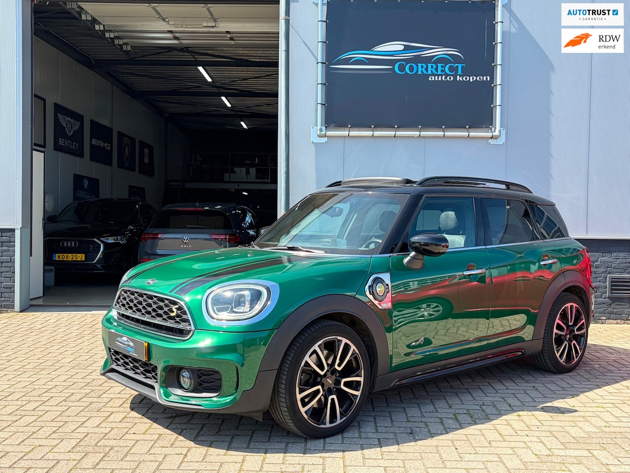 MINI Countryman - Mini 1.5 Cooper S E ALL4|JWC|Pano|HUD|H&K| - AutoWereld.nl