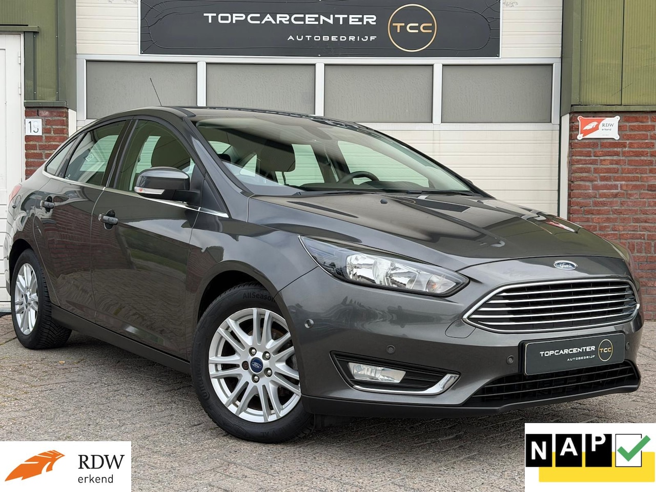 Ford Focus - 1.0 Titanium/NAVI/PARKS/CRUISE/TREKH/APK/NAP - AutoWereld.nl