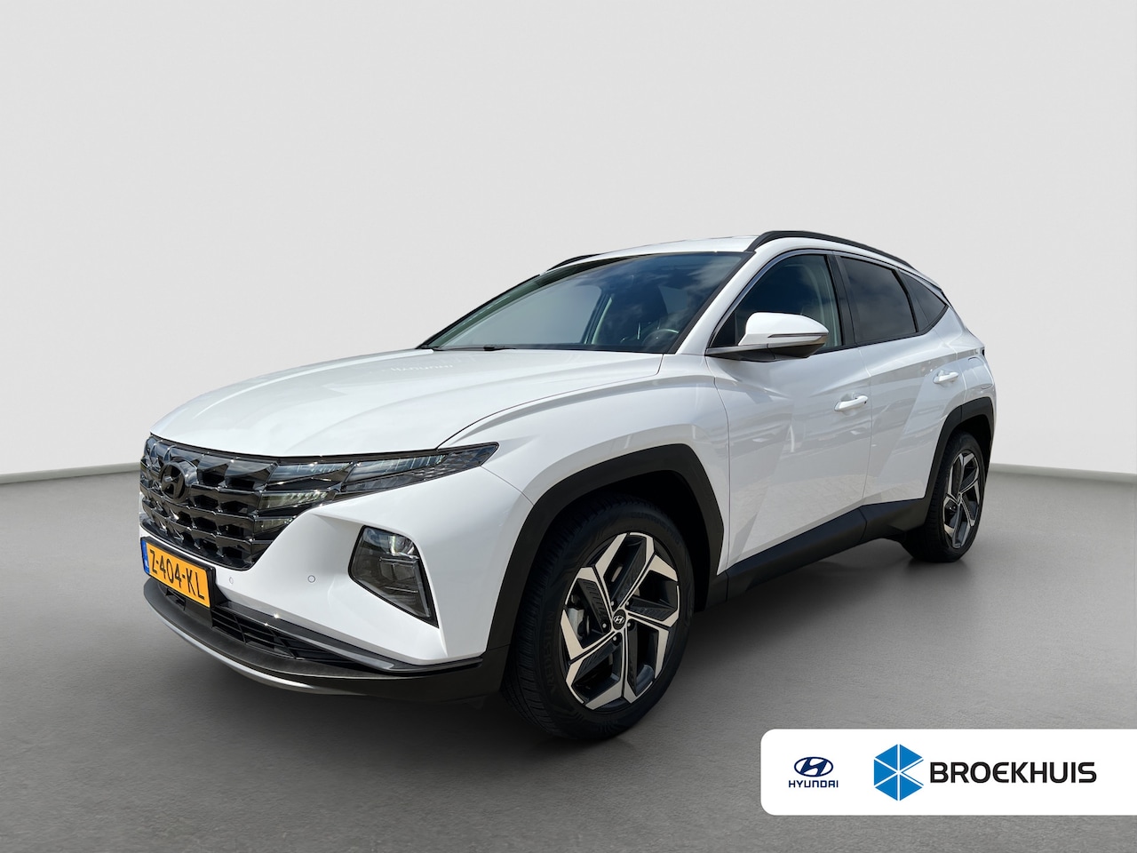 Hyundai Tucson - 1.6 T-GDI PHEV 265pk Comfort Smart 4WD | Climate | Camera | Carplay | Keyless | Navigatie - AutoWereld.nl