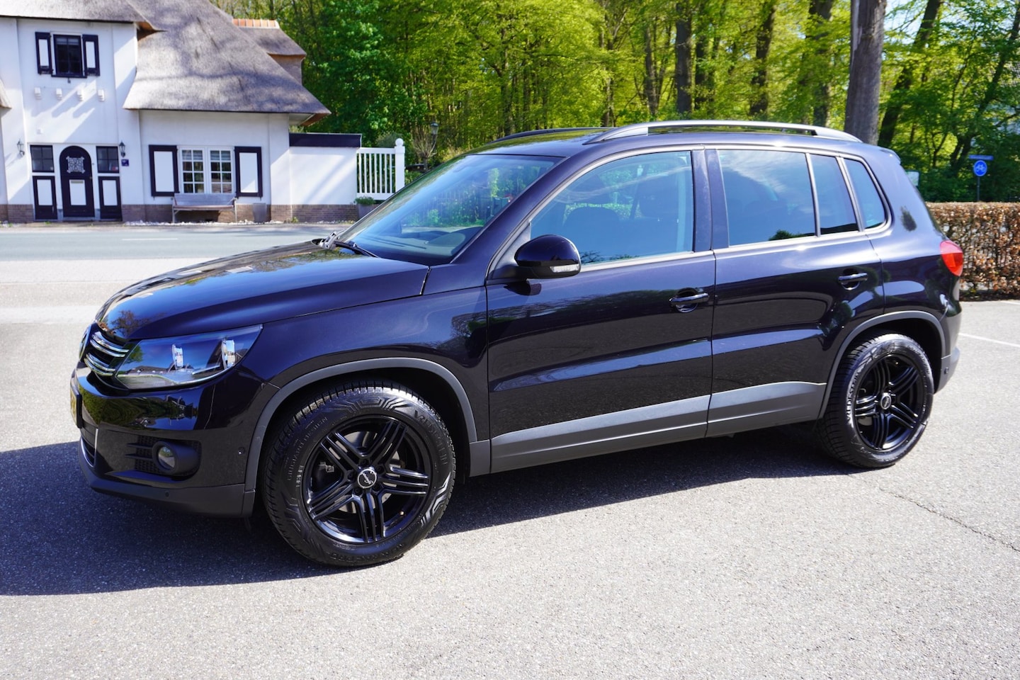 Volkswagen Tiguan - 1.4 TSI Sport&Style Airco Pdc Trekhaak - AutoWereld.nl