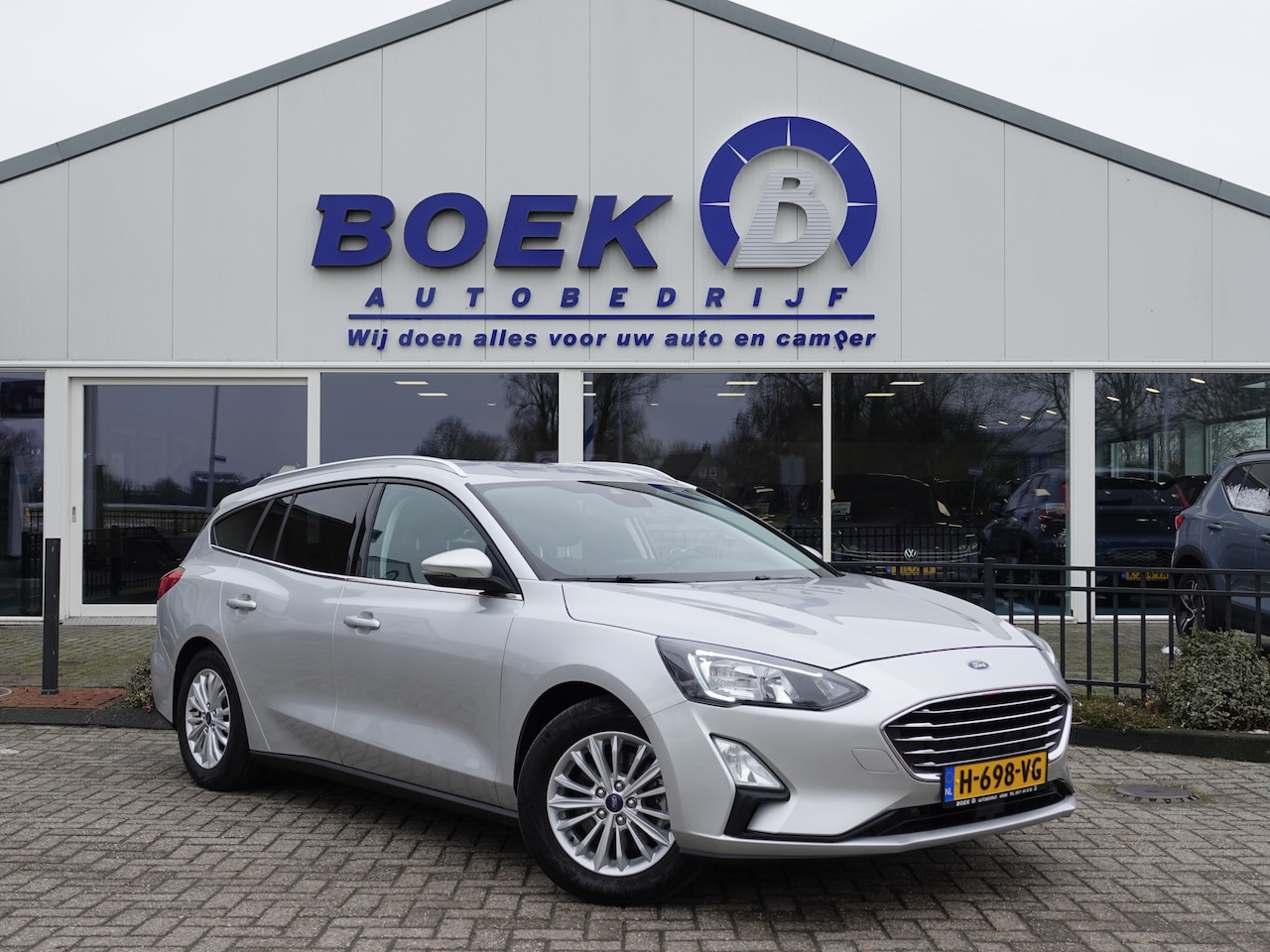 Ford Focus Wagon - 1.0 EcoBoost 125PK Titanium AUTOM. | TREKH. | WINTER | NAVI | CRUISE - AutoWereld.nl