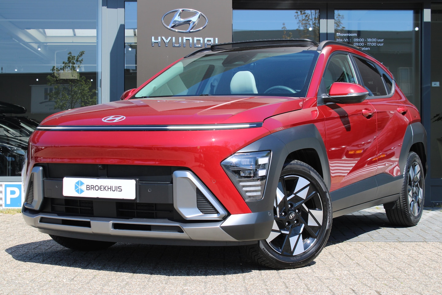 Hyundai Kona - 1.6 GDI HEV Premium Sky | Achterruitverwarming | Extra getint glas | Keyless entry - AutoWereld.nl