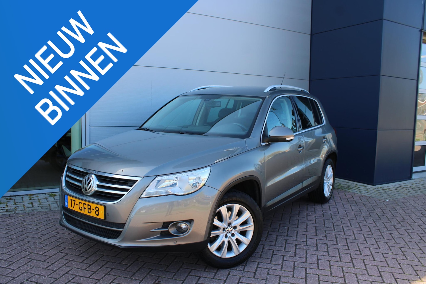 Volkswagen Tiguan - 1.4 TSI 150pk Sport&Style 4Motion Leer Airco Navi Trekhaak 2000kg APK tot 05-02-2027 - AutoWereld.nl