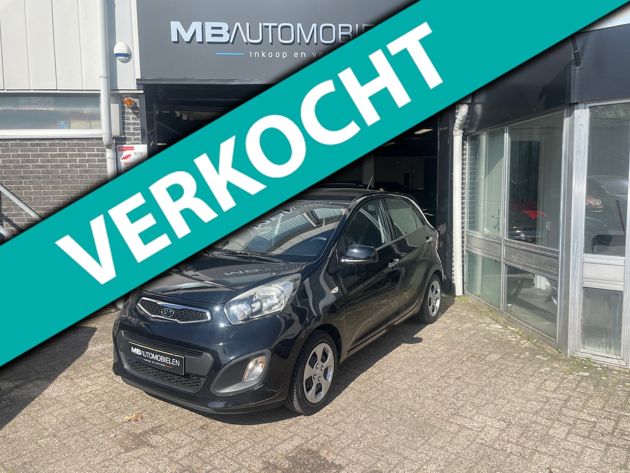 Kia Picanto - 1.0 CVVT Comfort Pack/Zwart/Clima/APK/Key less Go/NAP!! - AutoWereld.nl