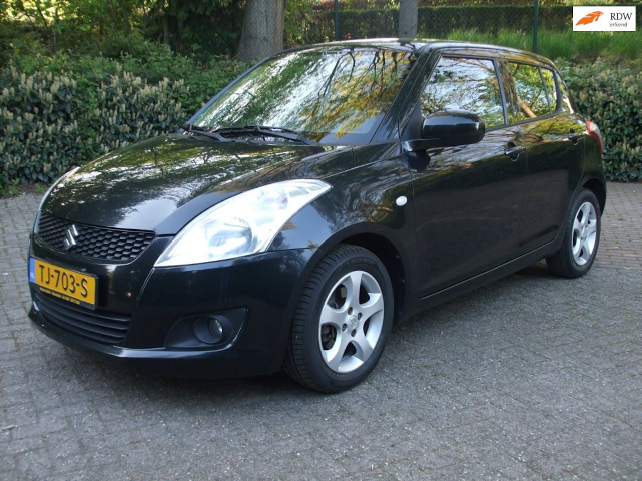Suzuki Swift - 1.2 Exclusive EASSS clima cruise zwart 5 drs - AutoWereld.nl