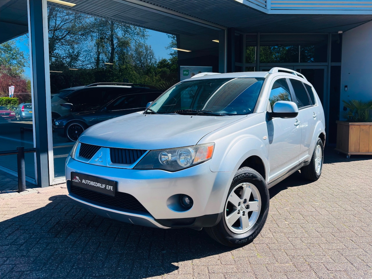 Mitsubishi Outlander - 2.4 Intro Edition 2WD Airco* Navi*Trkhk - AutoWereld.nl