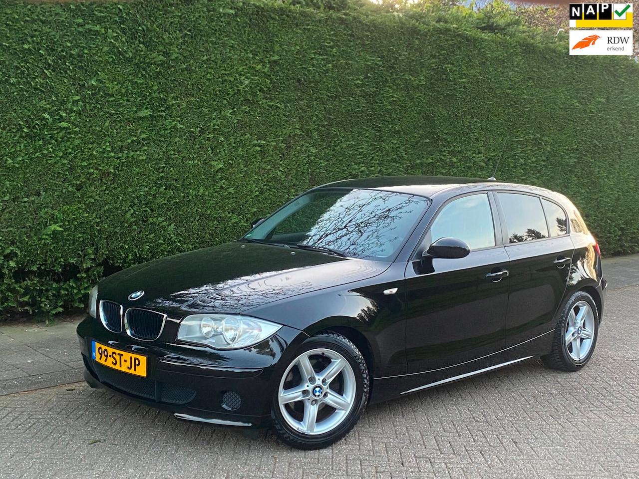 BMW 1-serie - 120i AIRCO KOUD/RIJDT GOED/LEER/STOELVWRMNG/NAVI - AutoWereld.nl