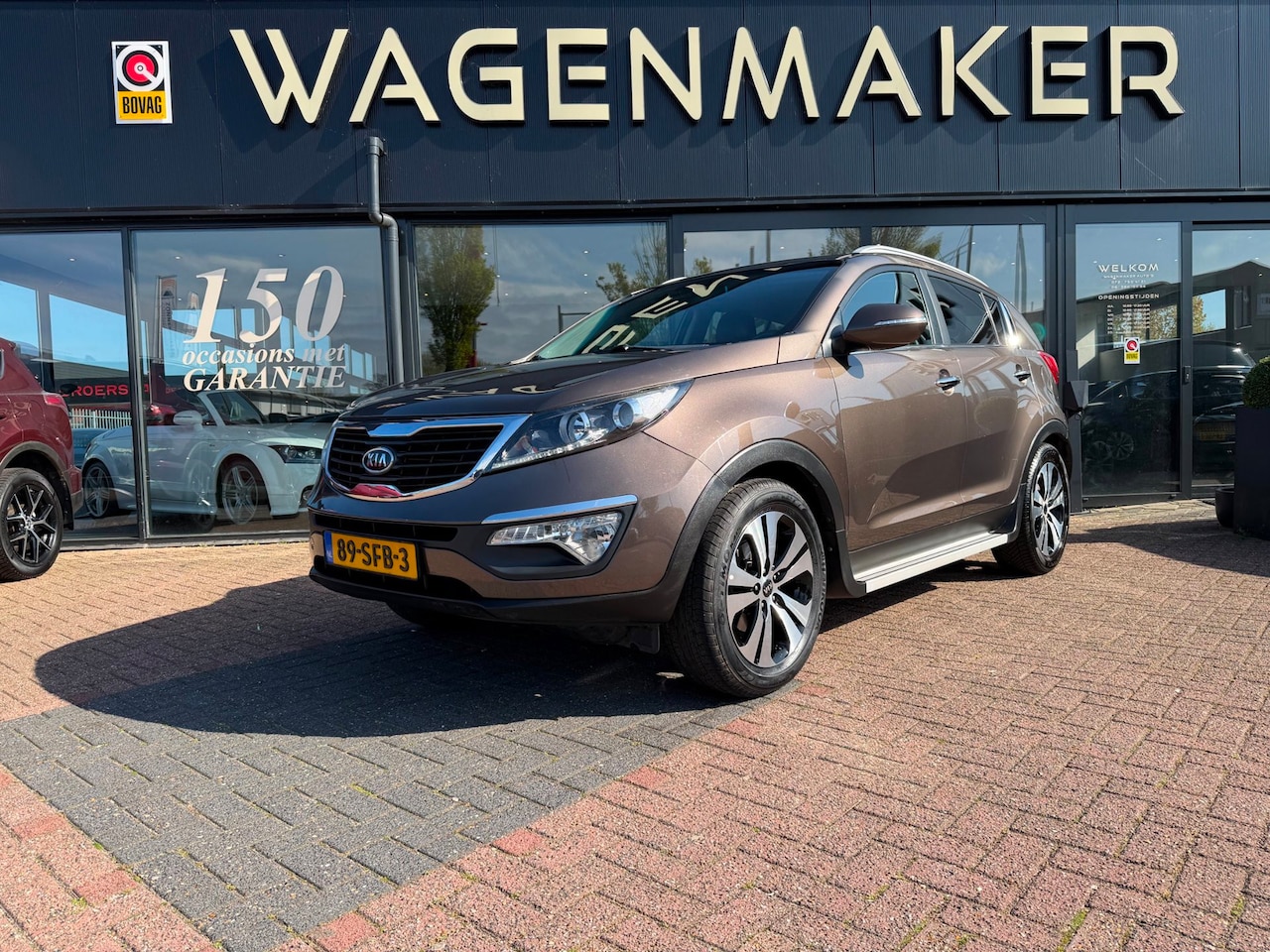 Kia Sportage - 2.0 X-clusive AUT|Navi|Cruise|Keyless|Leder! - AutoWereld.nl
