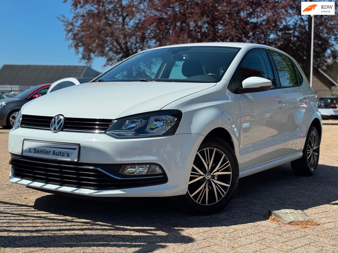 Volkswagen Polo - 1.2 TSI ALL STAR NAVIGATIE PDC CRUISE CTRL MF STUUR - AutoWereld.nl