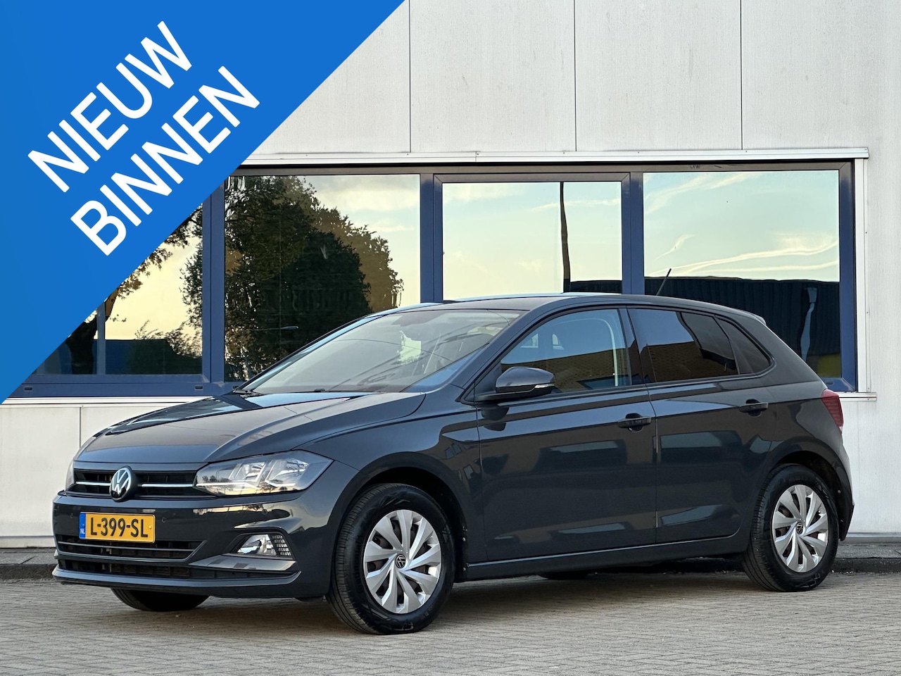 Volkswagen Polo - 1.0 TSI Comfortline l Praktisch nieuw l Adaptief l CarPlay l Trekhaak l - AutoWereld.nl