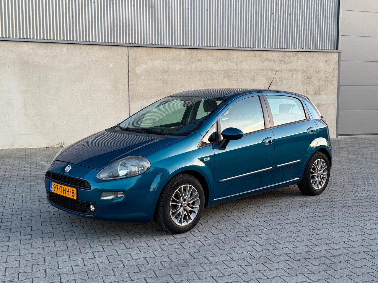 Fiat Punto Evo - 1.3 M-Jet Easy CLIMATE AIRCO+CRUISE+RADIO USB AUX+TREKHAAK+2 SLEUTELS - AutoWereld.nl