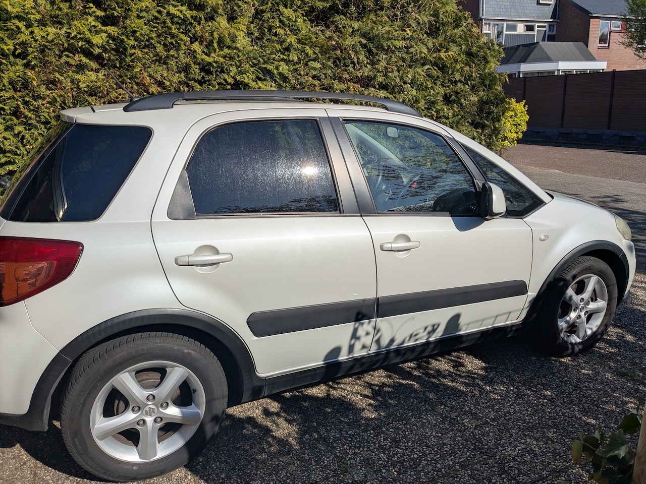 Suzuki SX4 - 1.6 Shogun Armsteun, navigatiescherm, handsfree bellen - AutoWereld.nl