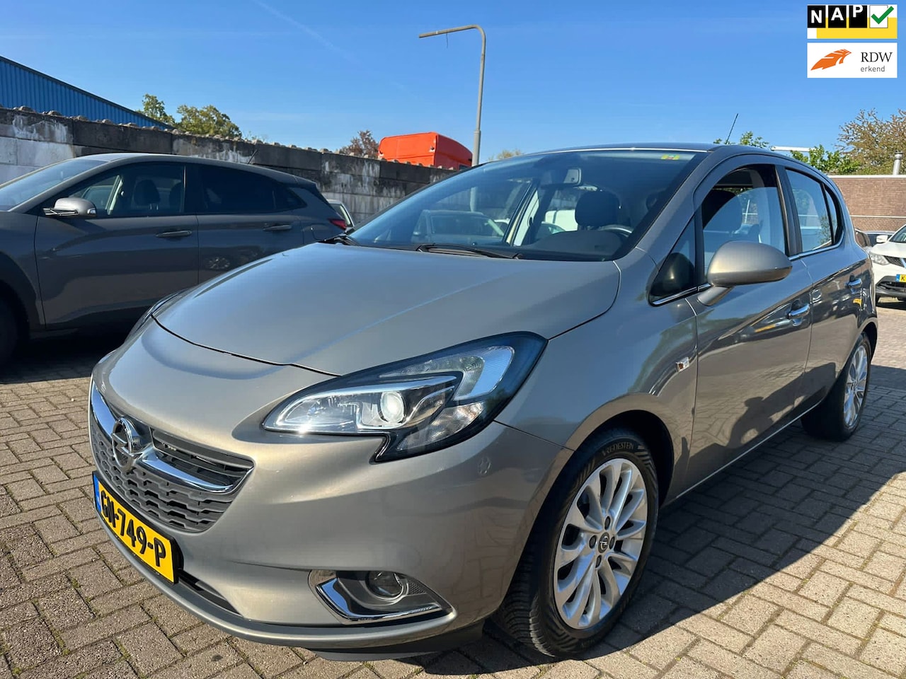 Opel Corsa - 1.4 Cosmo AUTOMAAT/ CLIMA/ XENON/ CRUISE! - AutoWereld.nl