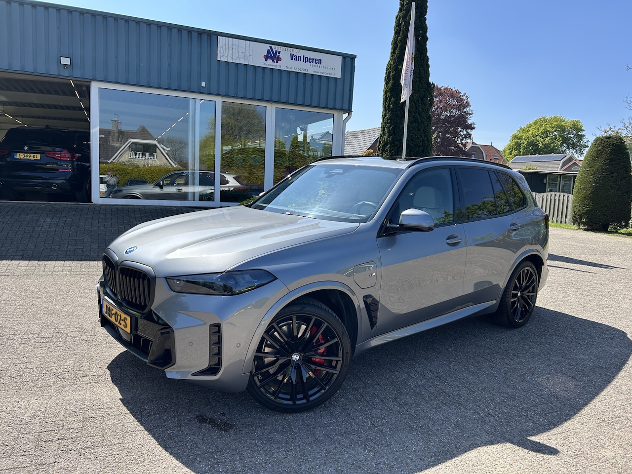 BMW X5 - xDrive50e M-Sport Pro Panoramadak 22inch - AutoWereld.nl