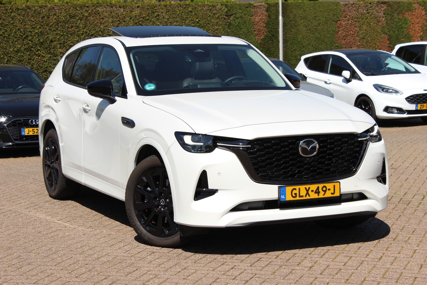 Mazda CX-60 - 2.5 e-SkyActiv PHEV Homura / SoH 95,8% / Trekhaak / Panoramadak / 360Camera / Head-up / Le - AutoWereld.nl