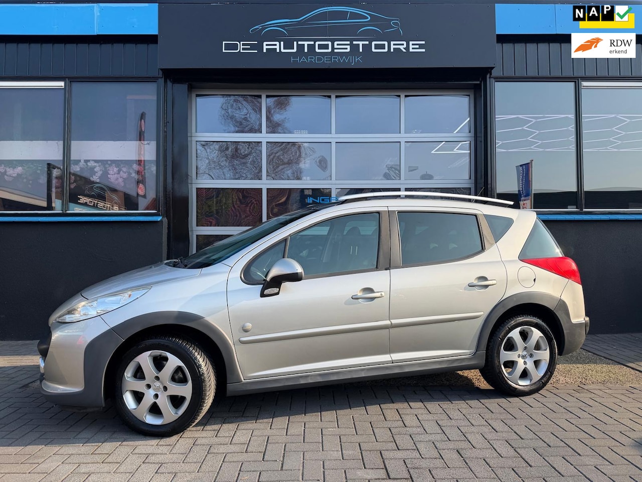 Peugeot 207 SW Outdoor - 1.6 VTi XS Airco Half leder Panodak Trekhaak bak ligt hoorbaar!! - AutoWereld.nl